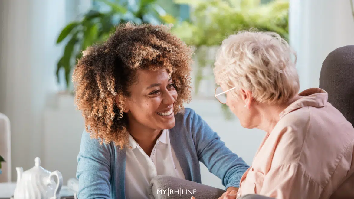 Comment accompagner les salariés aidants en 2025 Salariée aidante accompagne un proche